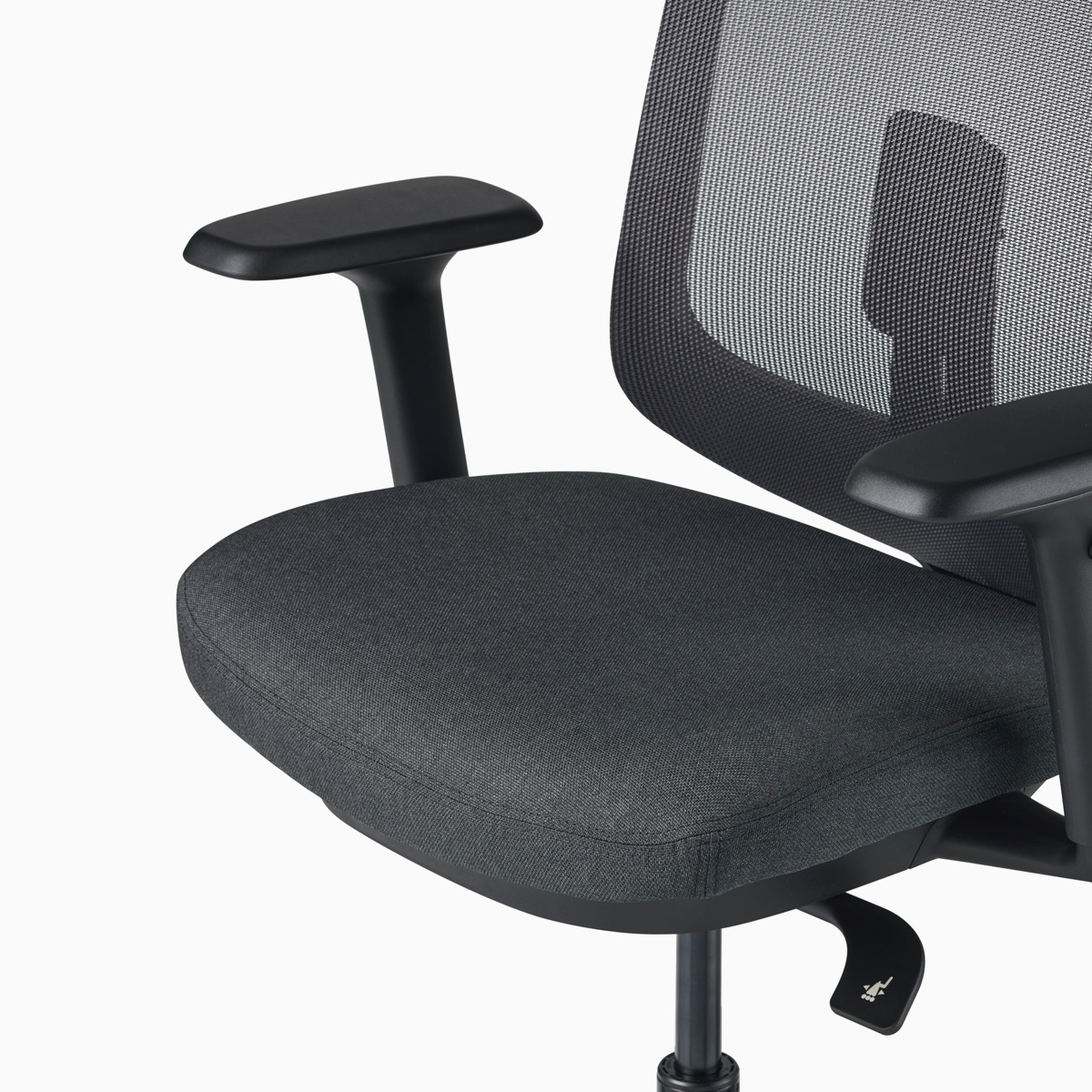 A close-up view of a Verus Chair's black upholstered seat.