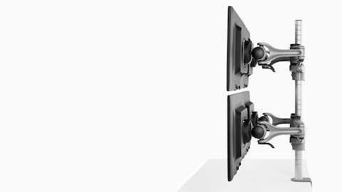 Profile view of four monitors attached to a single Wishbone Monitor Arm post. Profile view of four monitors attached to a single Wishbone Monitor Arm post.