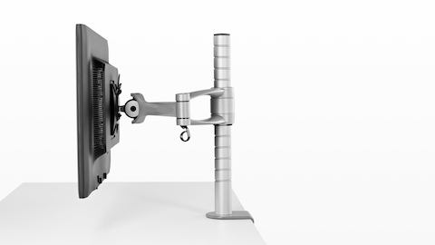 Profielweergave van een enkele monitor aangesloten op een Wishbone-monitor Armpost. Profielweergave van een enkele monitor aangesloten op een Wishbone-monitor Armpost.