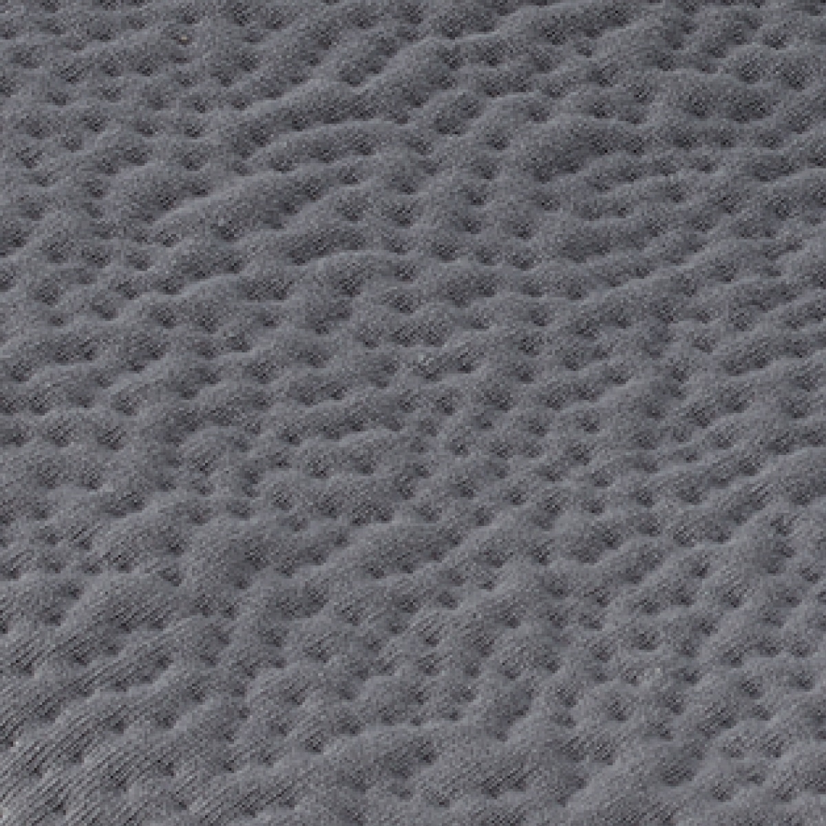 Close-up van het gebreide zitkussen in de kleur carbon