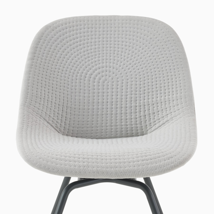 Front view of a Zeph Side Chair in Carbon with an alpine unibody.