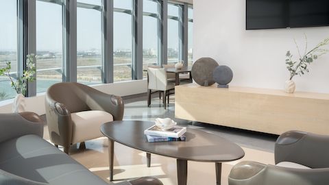 Nemschoff Florabella 3 seater sofa + 2 arm chairs with a Florabella coffee table all facing each other. Nemschoff Florabella 3 seater sofa + 2 arm chairs with a Florabella coffee table all facing each other.