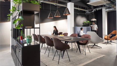 A meeting table surrounded by eight AAC 127 Soft Duo Chairs.