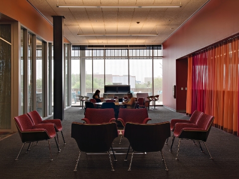 A student study lounge full of natural light and Swoop furnishings. 