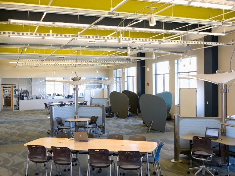 Intersect tables, Caper chairs, and Resolve workstations adorn a shared workspace. 