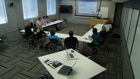 A conference table setup using Caper chairs and Everywhere tables. 