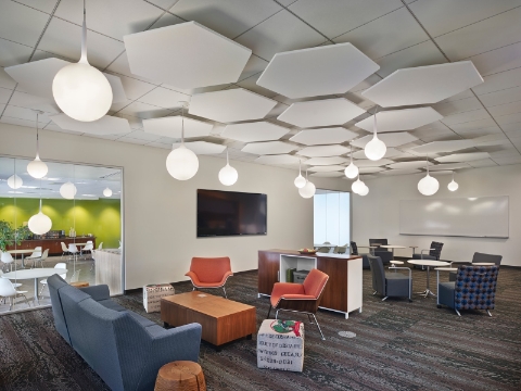 A multi-purpose office room with both lounge and table seating options. A multi-purpose office room with both lounge and table seating options.