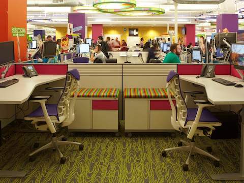 Quicken Loan staff work amongst Everywhere tables and Embody chairs. 