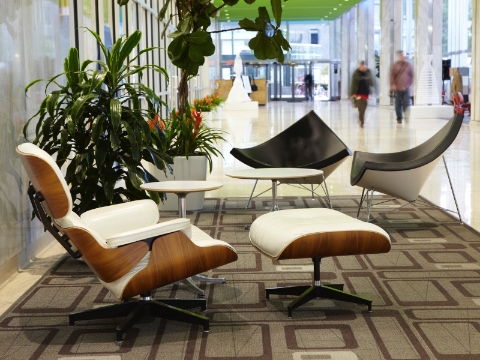 An office lobby outfitted with Eames and Nelson lounge seating. An office lobby outfitted with Eames and Nelson lounge seating.