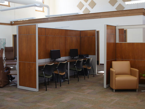 A computer station set up wth Everywhere tables and Aside chairs. 