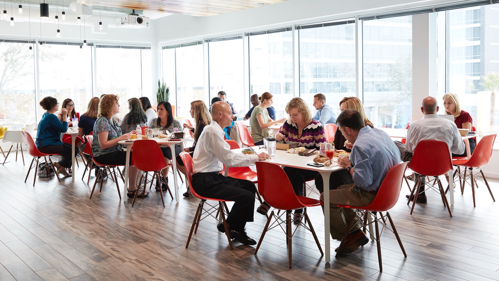 Employees at Tavistock gather in a Plaza setting, a place where they go to chat, laugh, and feel like part of the community.