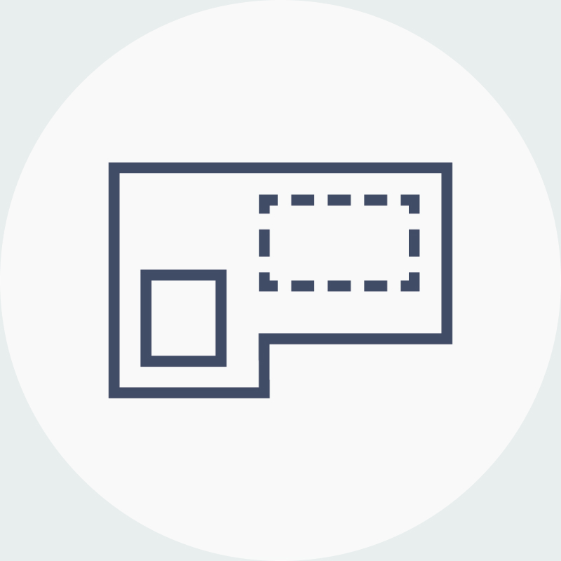 Graphic icon of a plan view building with a square and a broken-line rectangle to represent adaptive performance.