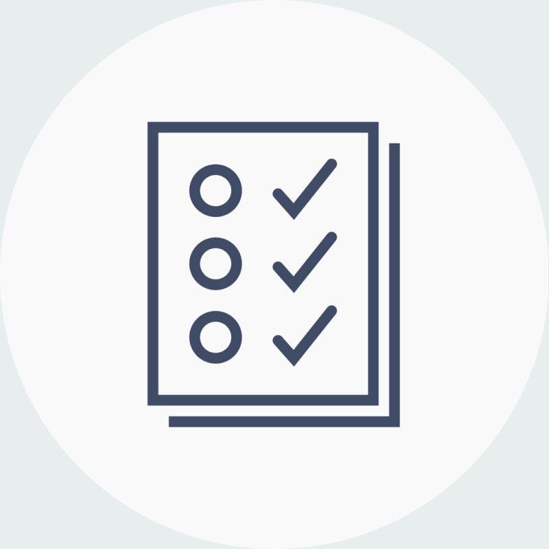 Graphic icon representing pages with circles and check marks to represent a standardization program.