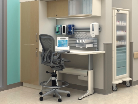 A small medical workstation with an Aeron chair. 