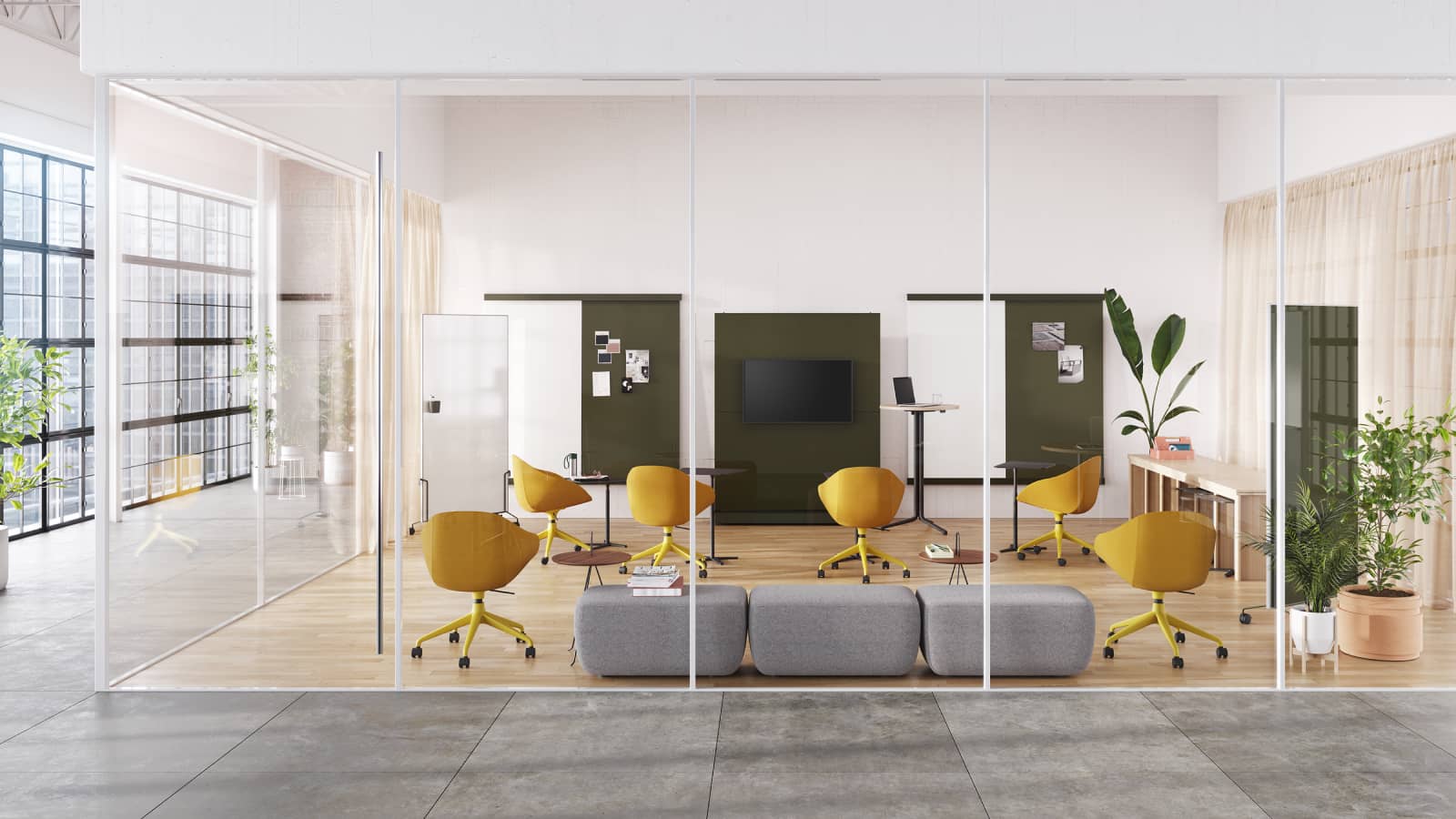 An evolved meeting space with the central conference table removed and replaced by reconfigurable furnishings like mobile whiteboards to encourage meeting attendees to make the space their own.