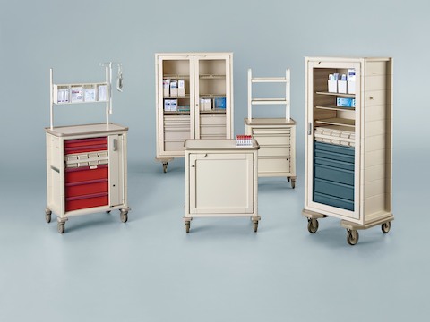 A selection of five mobile storage carts for organizing and transporting healthcare supplies. A selection of five mobile storage carts for organizing and transporting healthcare supplies.
