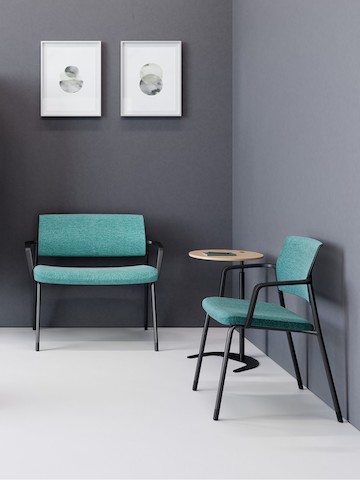 An exam room setting with a Verus Plus Chair, a Verus Side Chair, and a Plex table. An exam room setting with a Verus Plus Chair, a Verus Side Chair, and a Plex table.