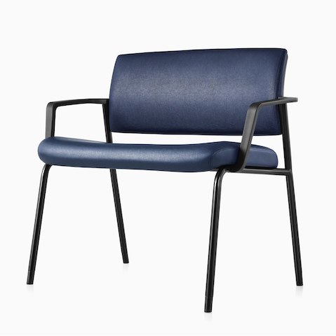 A Verus Plus Chair with arms in blue vinyl upholstery.