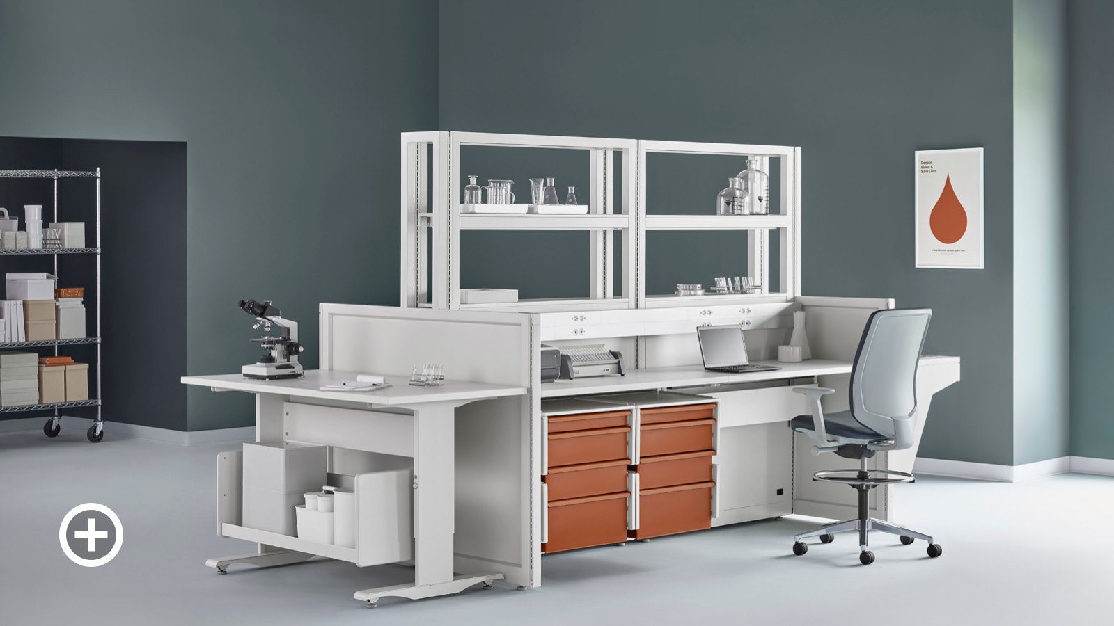 A lab setting with a Co/Struc System workstation and shelving in the center with a Verus work stool.