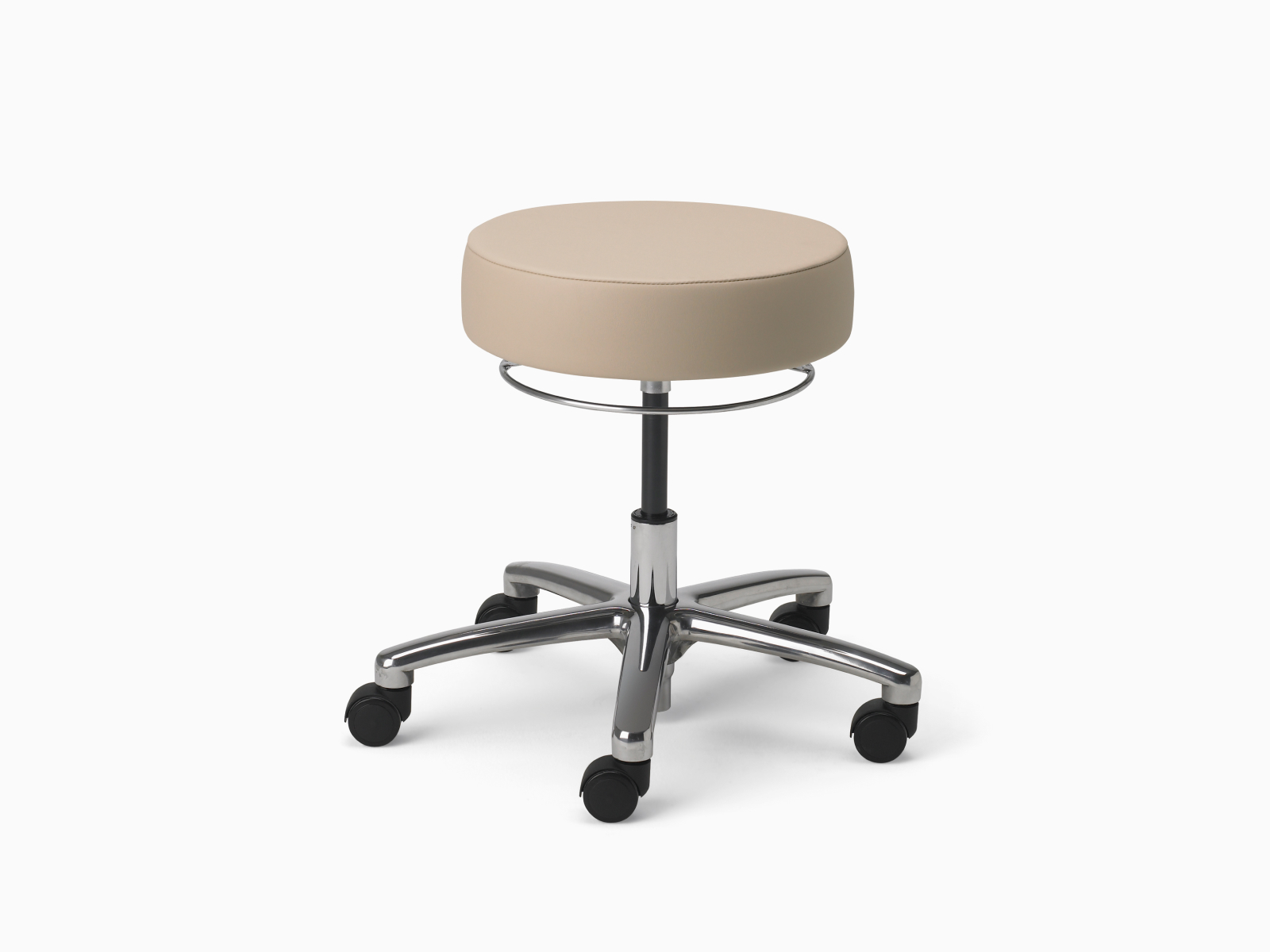 A Physician Stool in tan fabric with aluminum base and polyurethane casters.