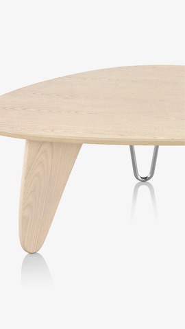 Partial view of a Noguchi Rudder Table. Select to see coffee tables and side tables available from the Herman Miller Store. 