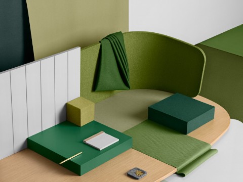 A materials palette featuring greens and neutrals. Select to read how material selection can support organizational purpose.