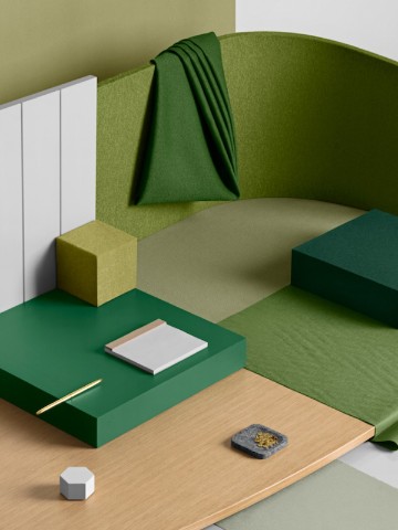 A materials palette featuring greens and neutrals.