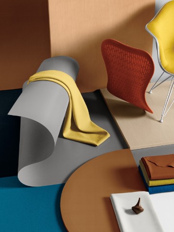 A materials palette featuring tan, blue, gray, and yellow.