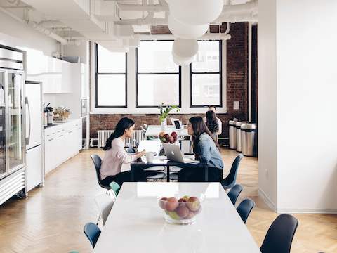 Harry's café is a casual setting where people connect and share ideas over lunch. 