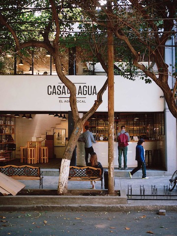 Héctor Esrawe and Ignacio Cadena created the interior and branding concept for the high-concept watering hole, Casa del Agua, which serves up super pure or herbal-infused rainwater, collected right on site.
