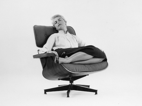 Actress Amanda Dunne in a fabric-covered Eames Lounge