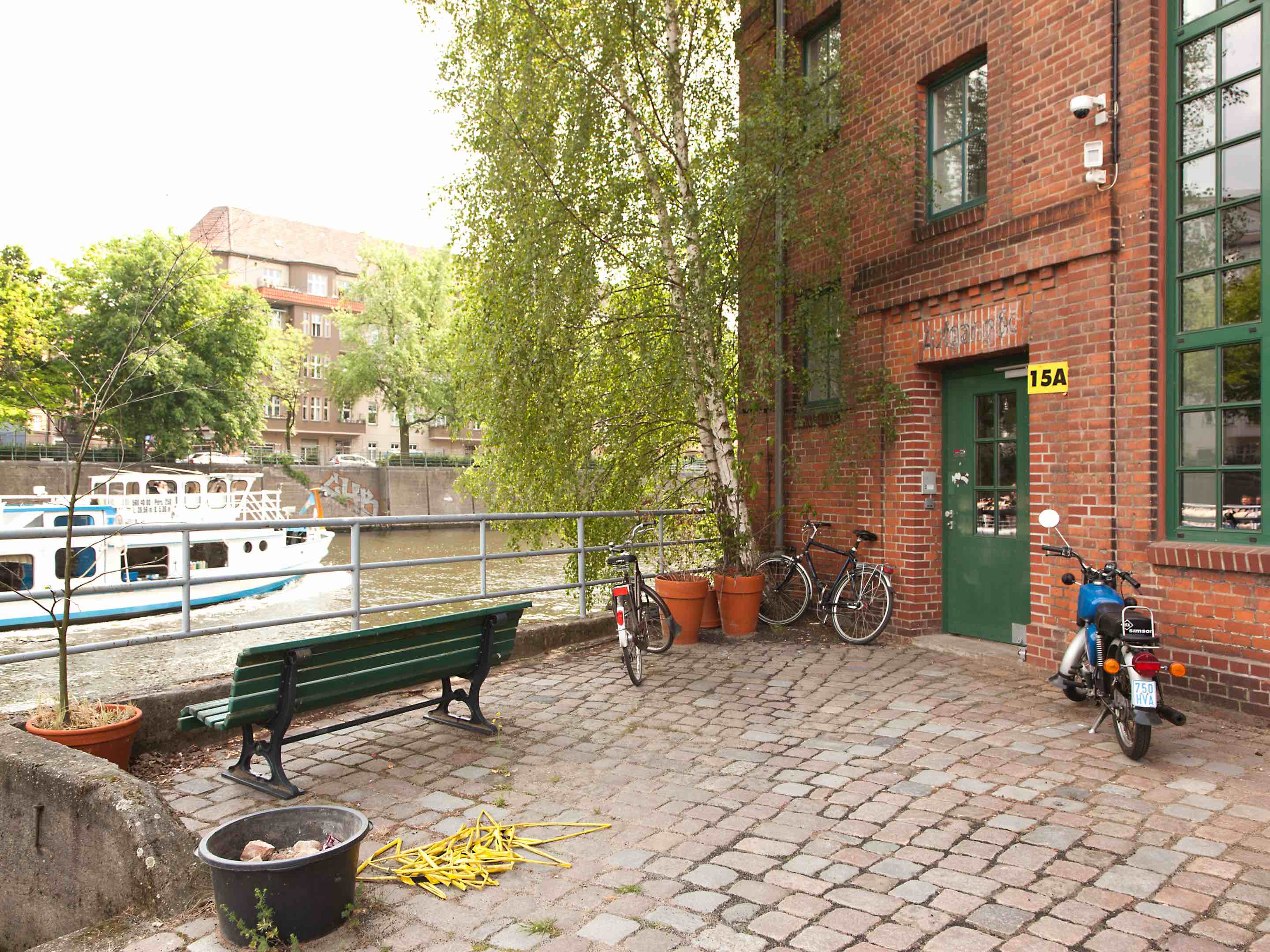The main entrance to Studio 7.5's workspace, which is set alongside the river Spree in the former western section of Berlin, Germany. Photo by Hello Design. The main entrance to Studio 7.5's workspace, which is set alongside the river Spree in the former western section of Berlin, Germany. Photo by Hello Design.