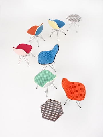 Eames Molded Plastic Side Chairs upholstered in Maharam Checkers. Eames Molded Plastic Side Chairs upholstered in Maharam Checkers.