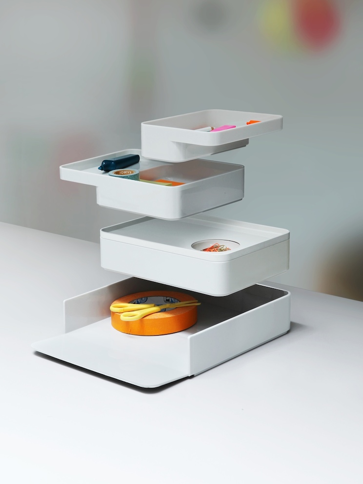Four Formwork desktop storage elements, each seemingly hovering above another. Four Formwork desktop storage elements, each seemingly hovering above another.