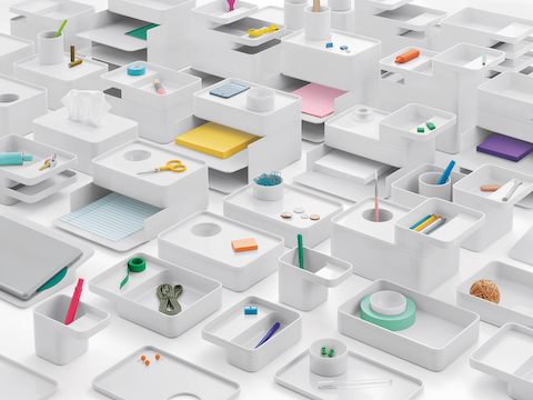 A collection of various Formwork desktop storage elements, all containing colorful work tools. A collection of various Formwork desktop storage elements, all containing colorful work tools.