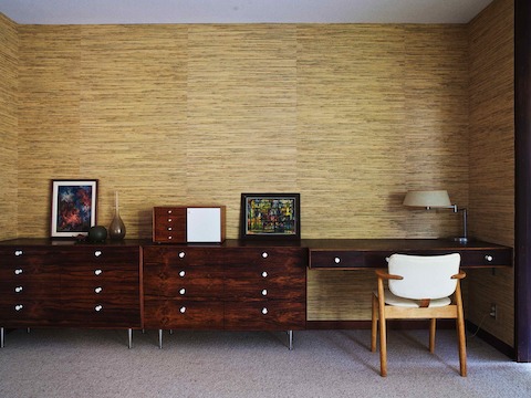 Vintage rosewood Thin Edge cabinets and a custom floating desk line one wall of the master bedroom. The Nelson Miniature Chest was the first vintage Herman Miller piece Corner collected. Vintage rosewood Thin Edge cabinets and a custom floating desk line one wall of the master bedroom. The Nelson Miniature Chest was the first vintage Herman Miller piece Corner collected.