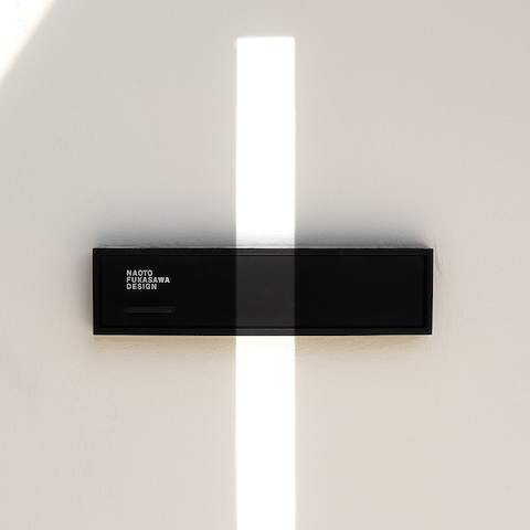 A sleek black nameplate for Naoto Fukasawa Design's studio.