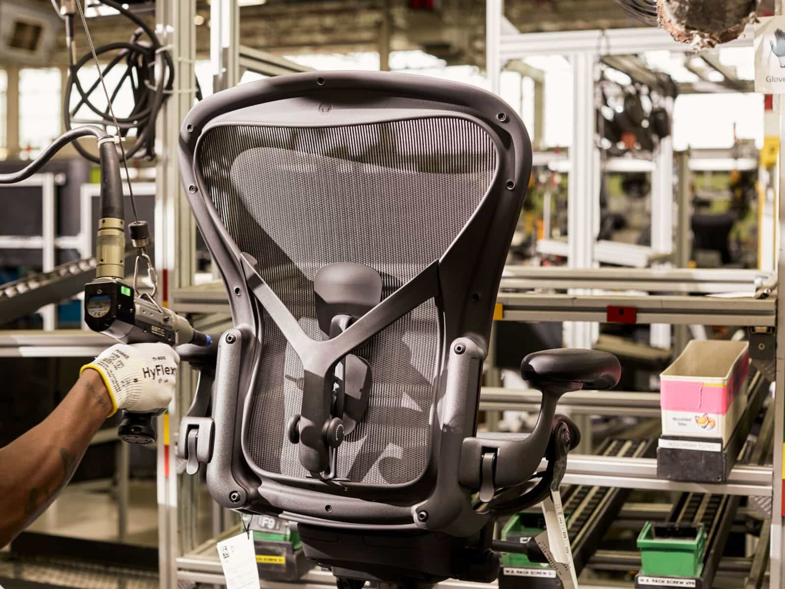 A back view of the Aeron Chair in its final stages of production on the assembly line.