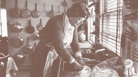Julia Child working at her kitchen sink, 1977. THF286973