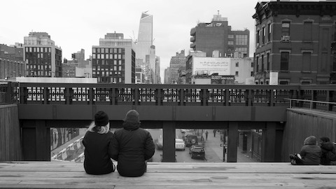 Two people overlooking a cityscape. Select to read an article about the reissuing of George Nelson's book How To See.