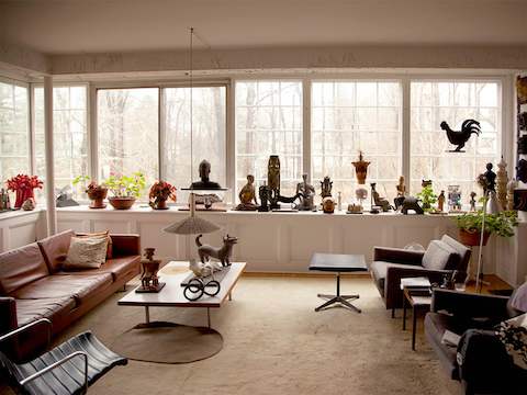 Sculptures created by designer Irving Harper occupy a window seat in the living room of his home. Sculptures created by designer Irving Harper occupy a window seat in the living room of his home.
