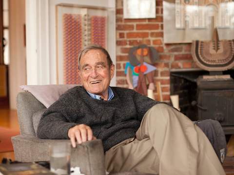 Designer Irving Harper relaxes at home. Designer Irving Harper relaxes at home.