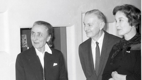 Alexander and Susan Girard standing next to Georgia O'Keeffe.