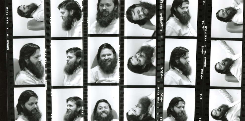 Contact sheet of black and white photographic negative portraits of Ray Wilkes from various angles and orientations.