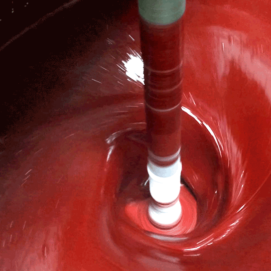 Newly reformulated colored resin is mixed in vats. Newly reformulated colored resin is mixed in vats.