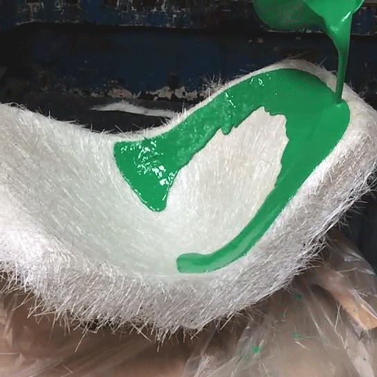 Preform is set in cradle and the new environmentally safe resin is applied by hand. Preform is set in cradle and the new environmentally safe resin is applied by hand.
