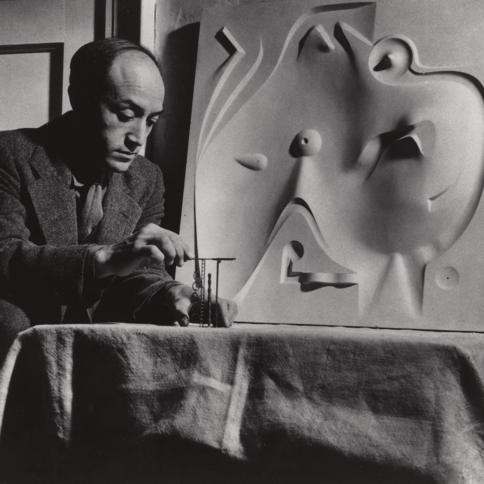 Noguchi with contoured playground model, 1946.