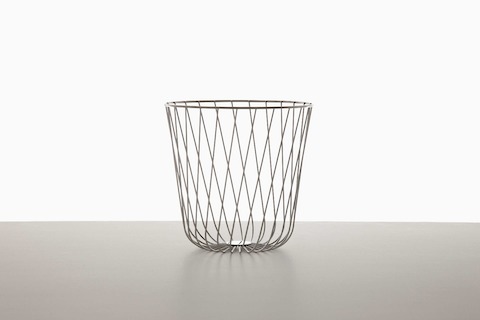 An empty round wire basket. An empty round wire basket.