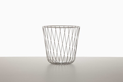 An empty round wire basket.