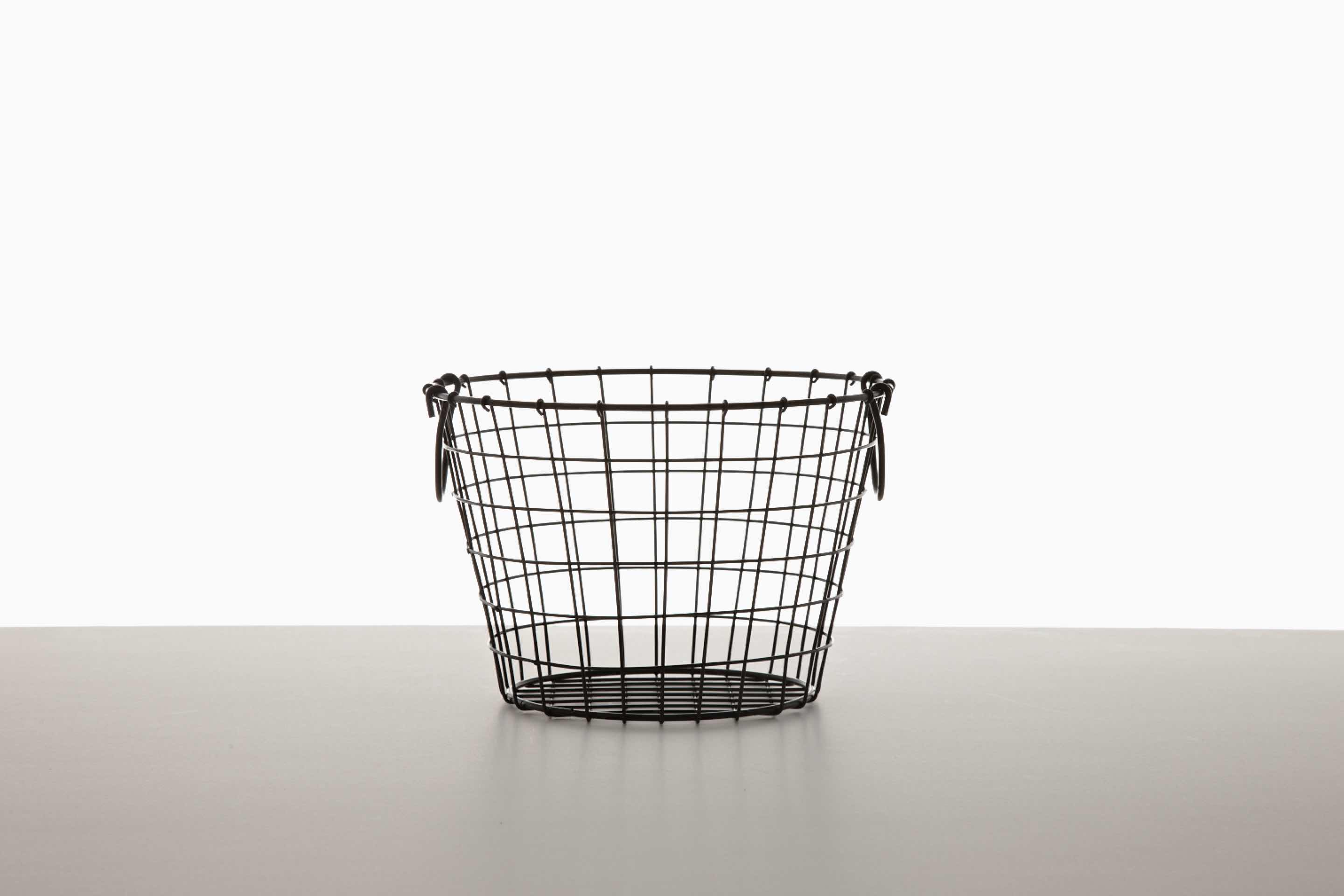 An empty black wire basket.